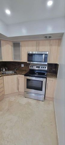 455 Golden Isles Dr 310, Hallandale Beach, FL 33009