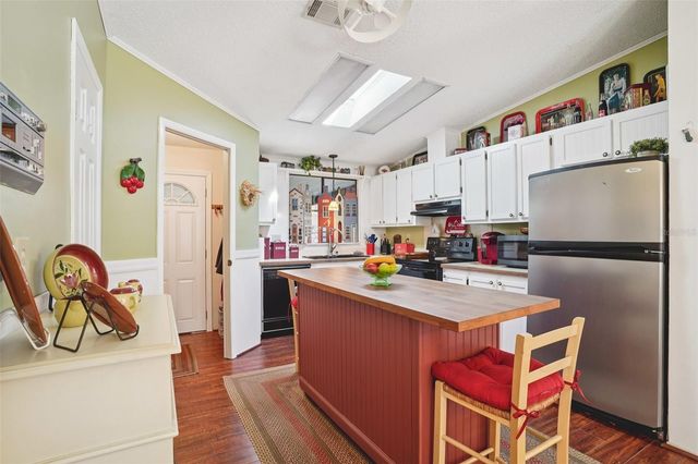 1409 TORREY PINES DRIVE, The Villages, FL 32159