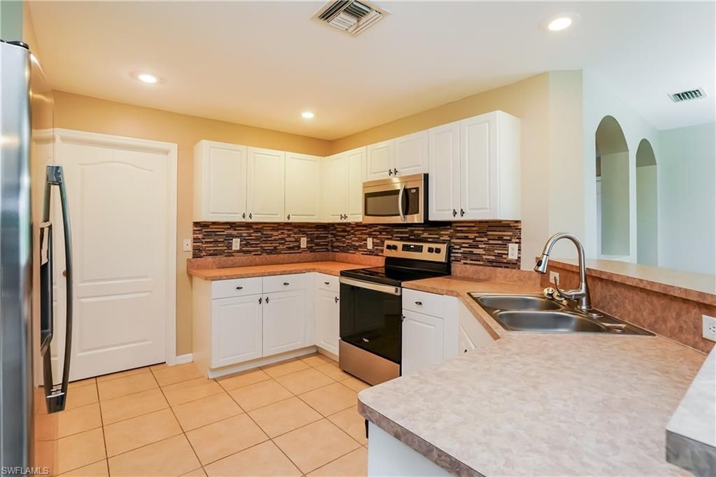 3208 13th ST SW, LEHIGH ACRES, FL 33976 — photo 4