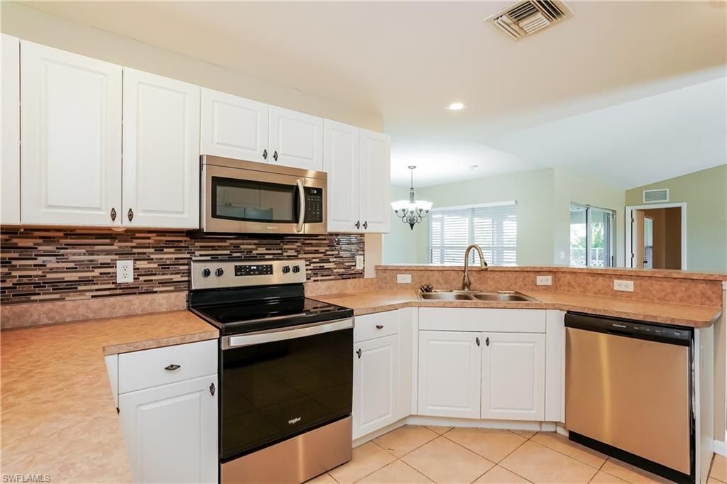 3208 13th ST SW, LEHIGH ACRES, FL 33976 — photo 5