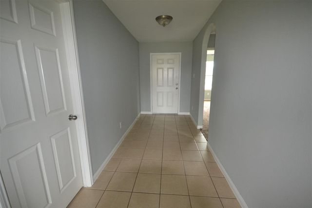 6958 Chessgate Falls Lane, Richmond, TX 77469