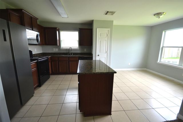 6958 Chessgate Falls Lane, Richmond, TX 77469