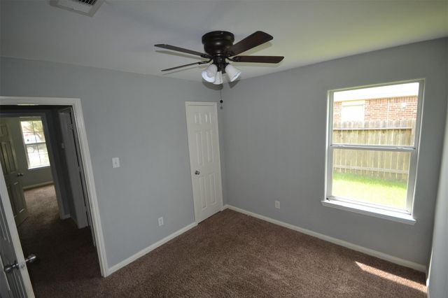 6958 Chessgate Falls Lane, Richmond, TX 77469
