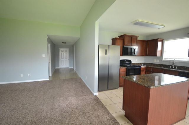 6958 Chessgate Falls Lane, Richmond, TX 77469