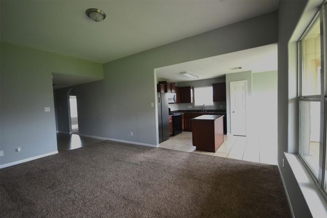 6958 Chessgate Falls Lane, Richmond, TX 77469