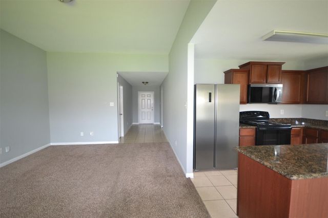 6958 Chessgate Falls Lane, Richmond, TX 77469