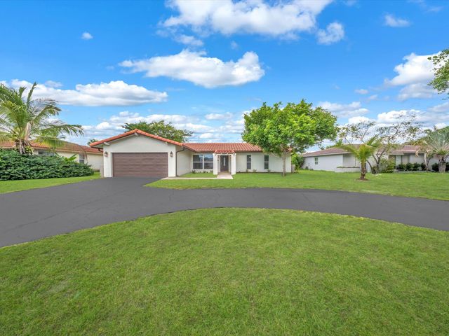 834 Ramblewood Drive, Coral Springs, FL 33071