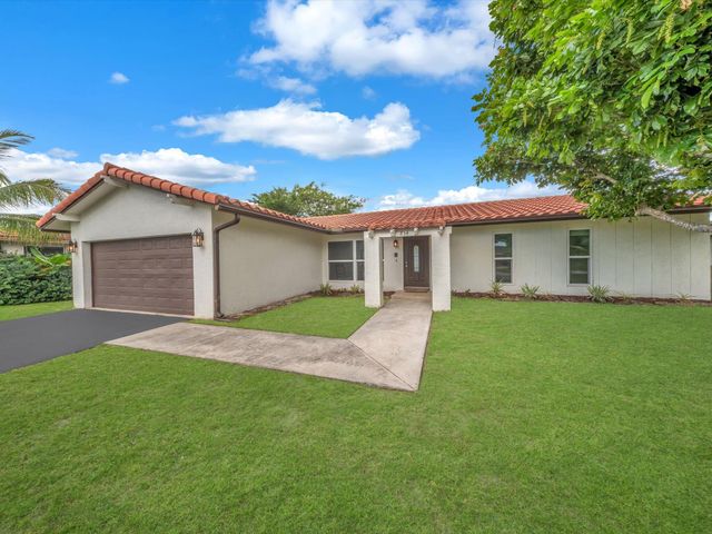 834 Ramblewood Drive, Coral Springs, FL 33071