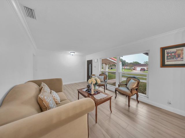 834 Ramblewood Drive, Coral Springs, FL 33071