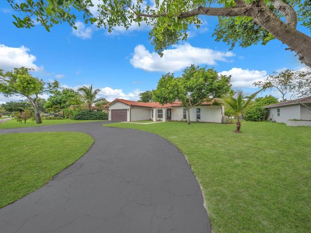 834 Ramblewood Drive, Coral Springs, FL 33071