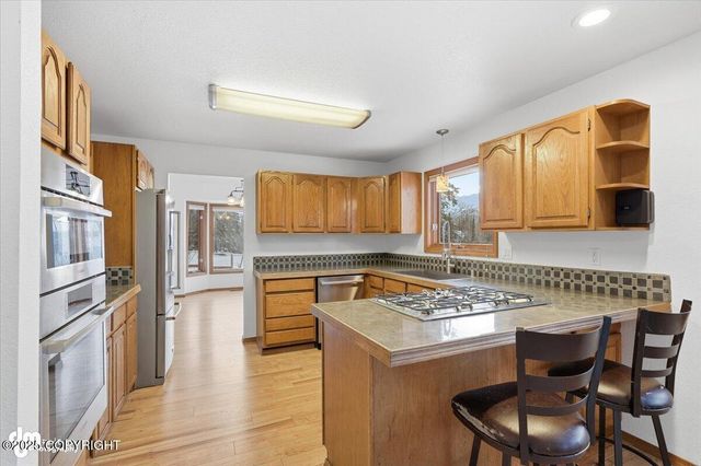 10220 Silvertip Circle, Eagle River, AK 99577