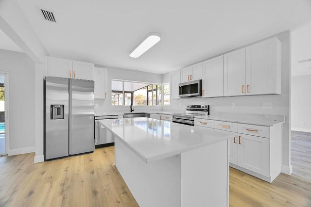 1704 SE Adair Road, Port St. Lucie, Port St Lucie, FL 34984