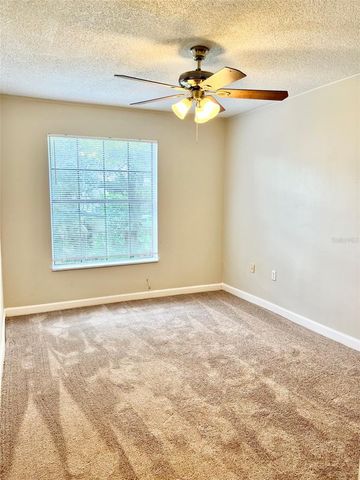 6065 VILLAGE CIRCLE 6065, Orlando, FL 32822