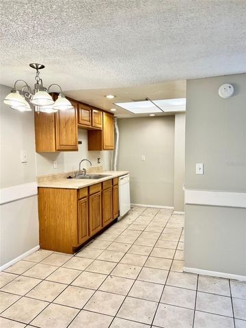 6065 VILLAGE CIRCLE 6065, Orlando, FL 32822