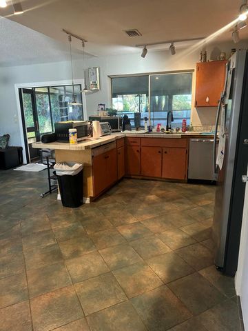 8812 SE Sandridge Avenue, Hobe Sound, FL 33455