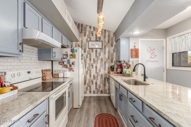 14011 W ALEPPO Drive, Sun City West, AZ 85375