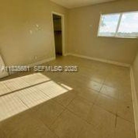 3421 NW 44th Street 103, Oakland Park, FL 33309