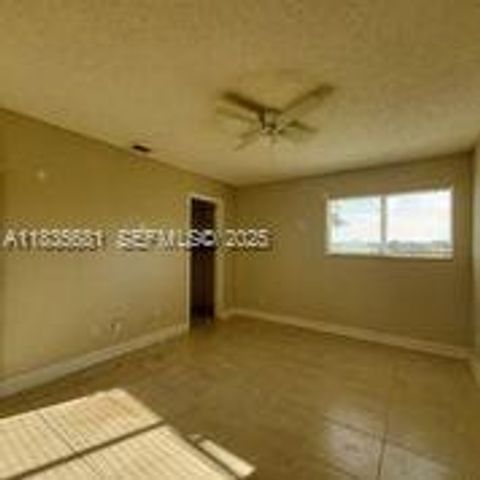 3421 NW 44th Street 103, Oakland Park, FL 33309