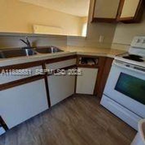 3421 NW 44th Street 103, Oakland Park, FL 33309