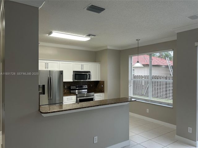 16120 Opal Creek Dr, Weston, FL 33331