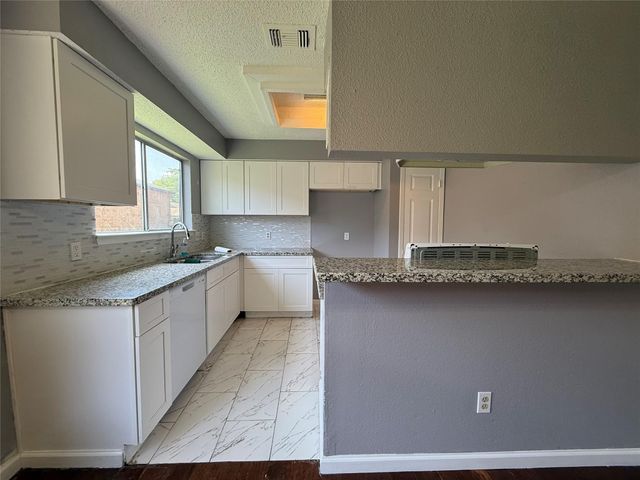 8715 Belle Glen Drive, Houston, TX 77099