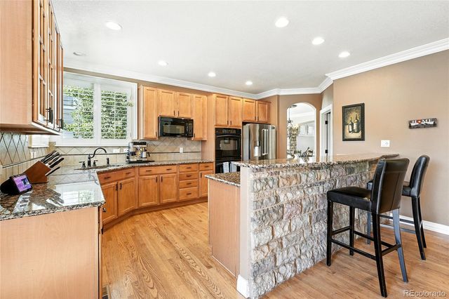 7809 S Coolidge Way, Aurora, CO 80016