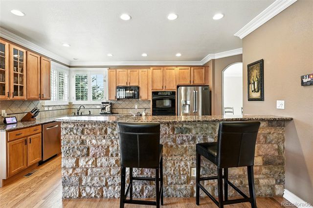 7809 S Coolidge Way, Aurora, CO 80016