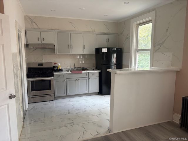10144 106th Street, Ozone Park, NY 11416