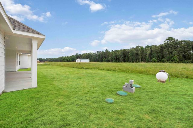 400 Barton Place Drive, Tarkington, TX 77327