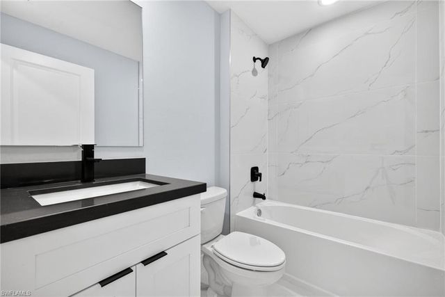 702 Carbon ST E, Lehigh Acres, FL 33974