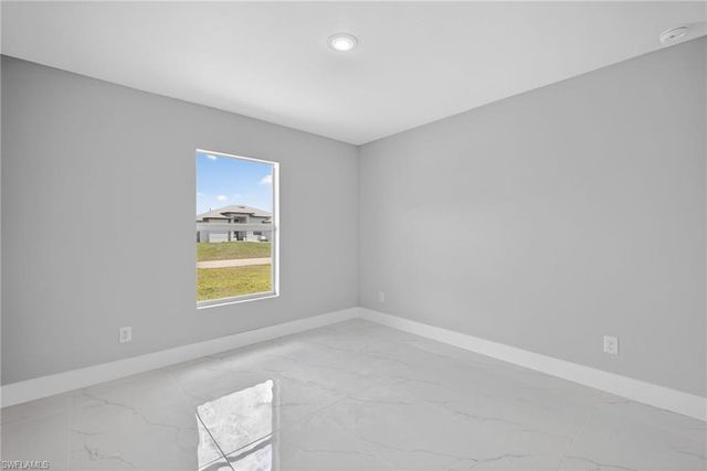 702 Carbon ST E, Lehigh Acres, FL 33974