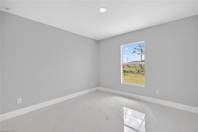 702 Carbon ST E, Lehigh Acres, FL 33974