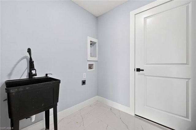 702 Carbon ST E, Lehigh Acres, FL 33974