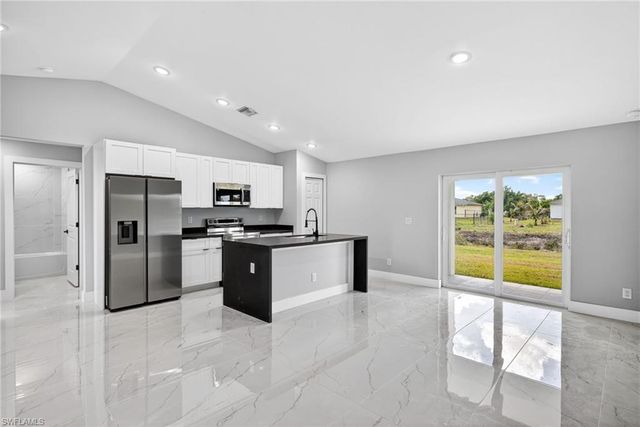 702 Carbon ST E, Lehigh Acres, FL 33974