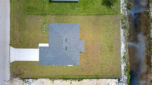 702 Carbon ST E, Lehigh Acres, FL 33974