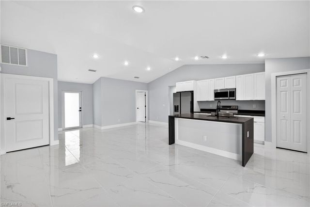 702 Carbon ST E, Lehigh Acres, FL 33974