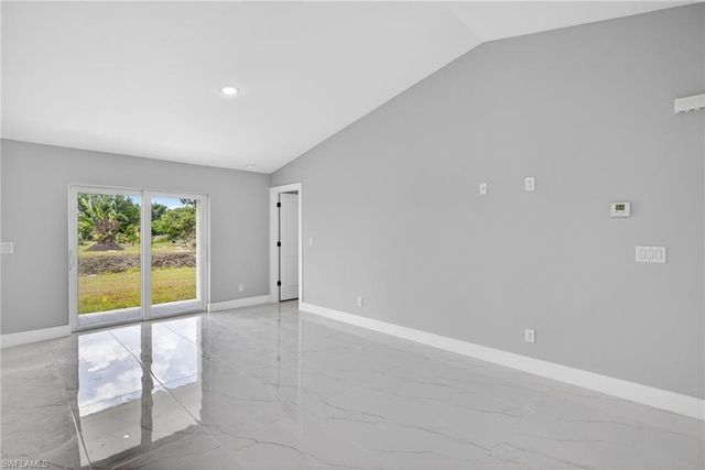 702 Carbon ST E, Lehigh Acres, FL 33974