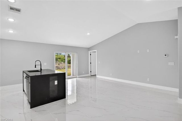 702 Carbon ST E, Lehigh Acres, FL 33974