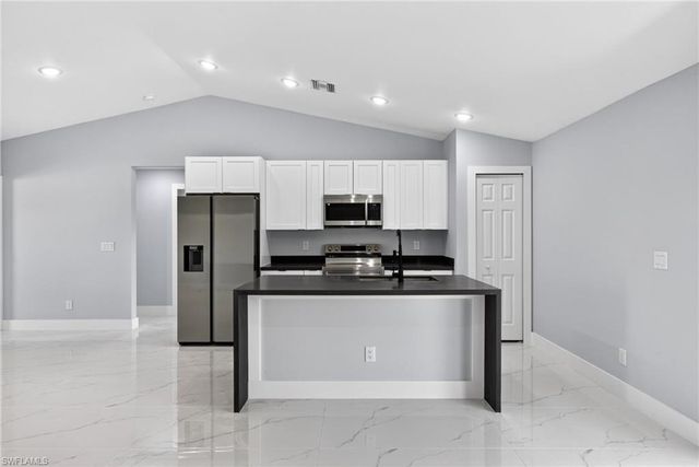 702 Carbon ST E, Lehigh Acres, FL 33974