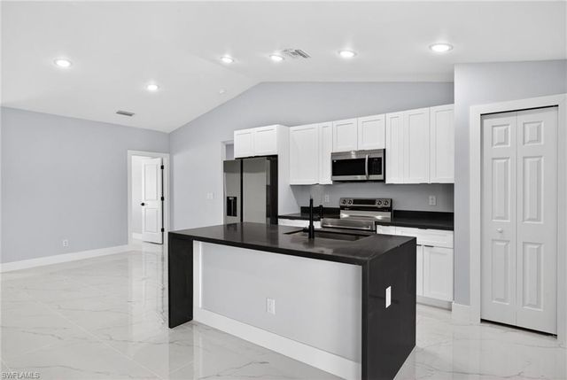 702 Carbon ST E, Lehigh Acres, FL 33974