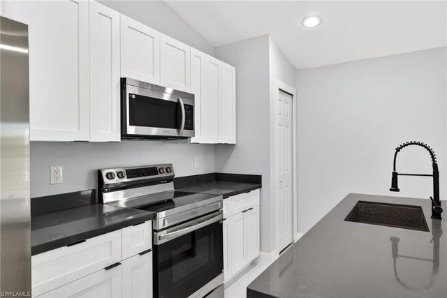 702 Carbon ST E, Lehigh Acres, FL 33974