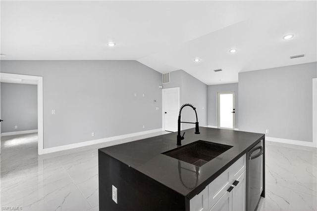 702 Carbon ST E, Lehigh Acres, FL 33974