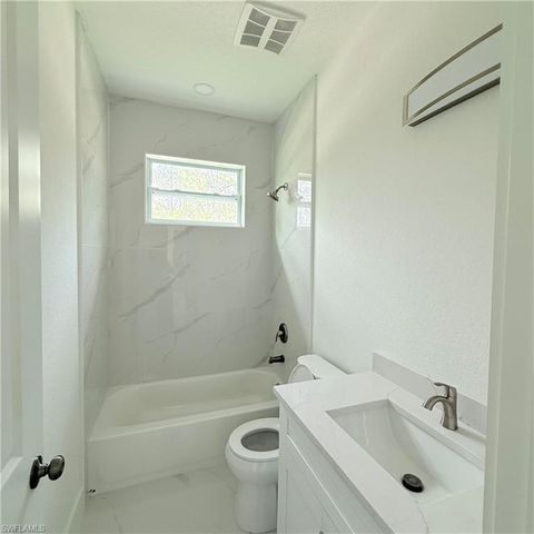 208 Johns AVE, Lehigh Acres, FL 33936