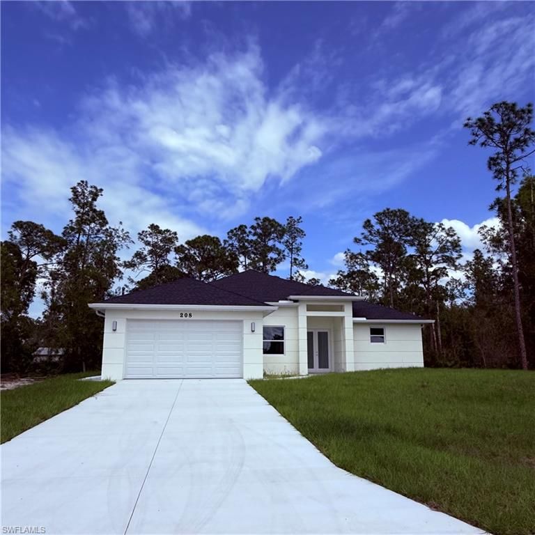208 Johns AVE, Lehigh Acres, FL 33936