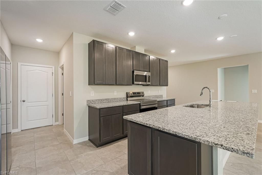617 SE 3rd TER, CAPE CORAL, FL 33990 — photo 5