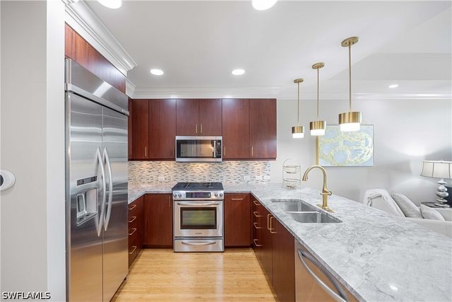 9123 Strada PL 7408, Naples, FL 34108