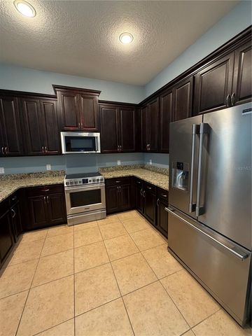 12952 BRANDON COATES DRIVE, Orlando, FL 32828