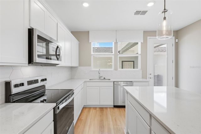 4560 MAPLE WALTZ ALLEY, Clermont, FL 34714