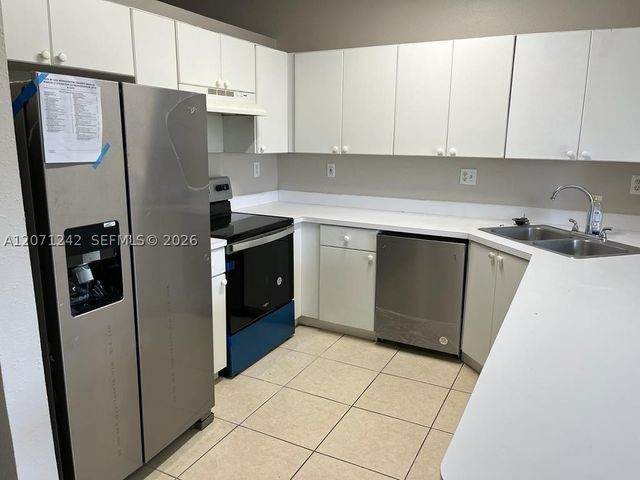 6940 NW 179th St 404-7, Hialeah, FL 33015