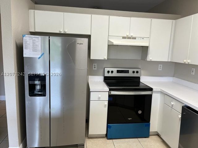 6940 NW 179th St 404-7, Hialeah, FL 33015